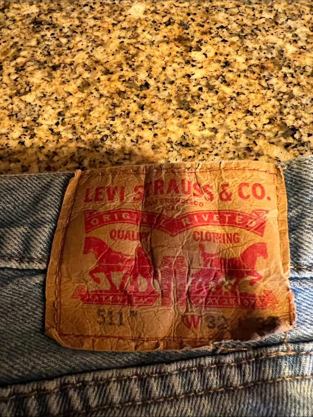 Levi's Blue Denim Jeans with Brown Leather Patch and Red Logo